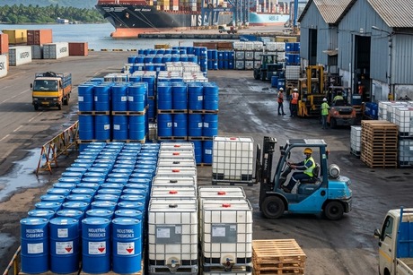 Industrial chemical drums stored in warehouse